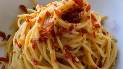 Smashed Spring Pea Spaghetti Carbonara with Prosciutto Crumbs